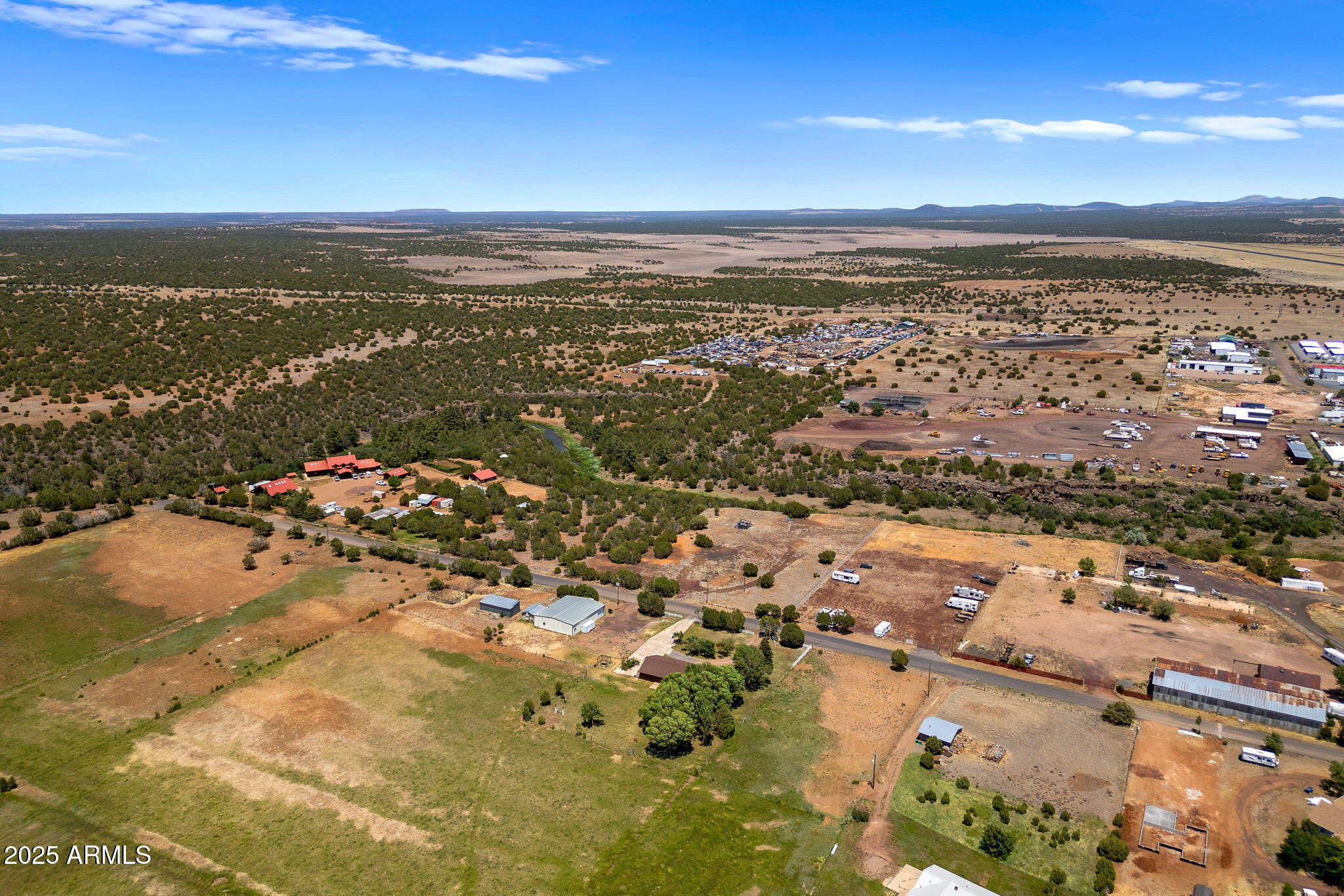 2101 North 6th Street, Unit 68 Show Low, AZ 85901 - Photo 15 of 17 an aerial view of residential building and ocean