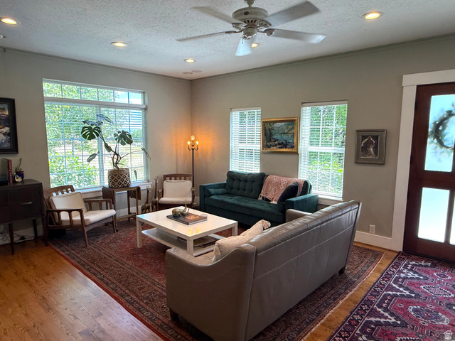 776 Canyon Road Hyde Park, UT 84318 - Photo 12 of 57 Spacious living area featuring wood-finish flooring, recessed lighting, and a ceiling fan