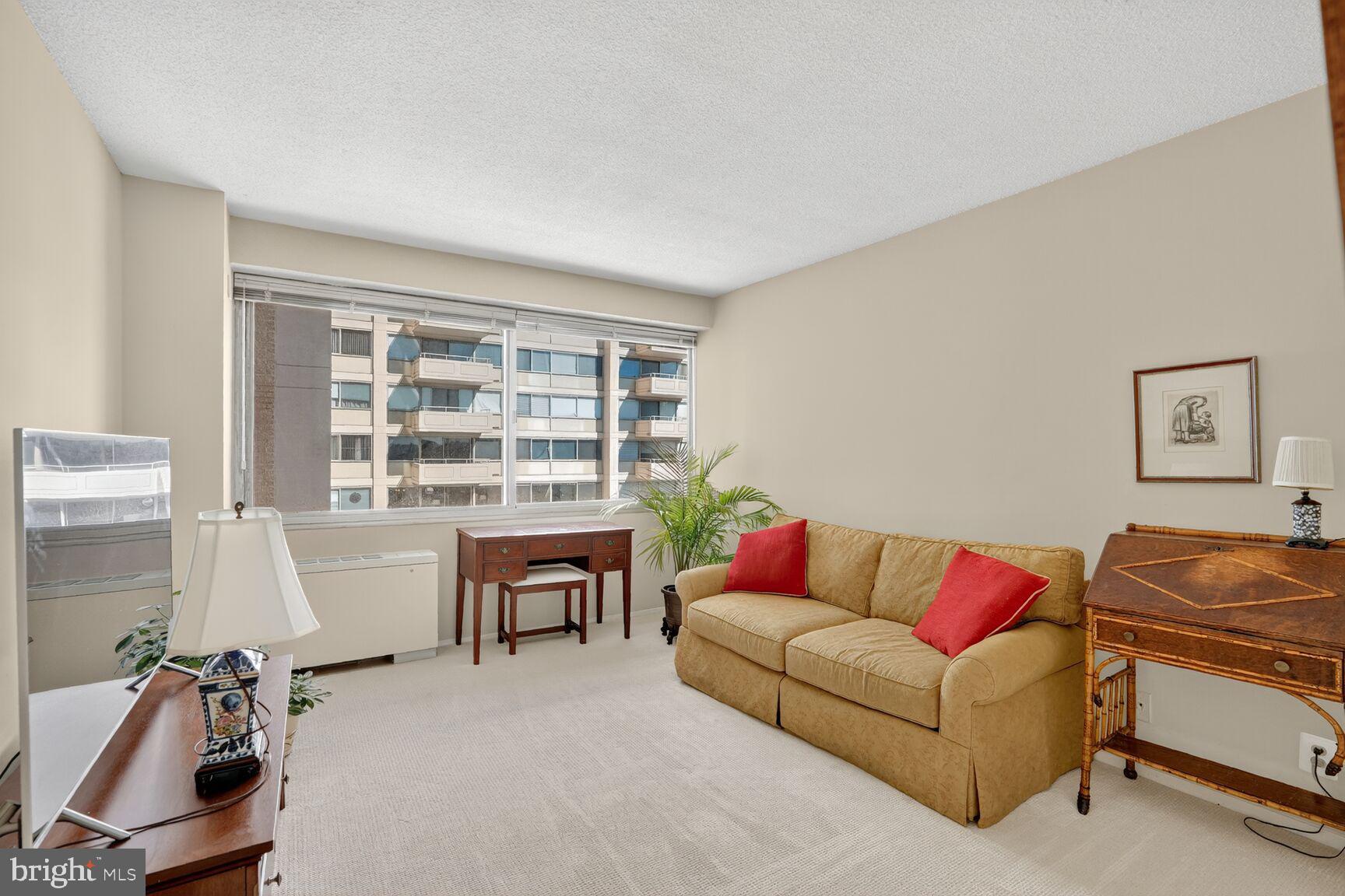 4515 Willard Avenue, Unit 1421S Chevy Chase, MD 20815 - Photo 12 of 53 a living room with furniture and a window