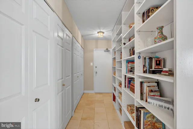 a white refrigerator freezer sitting inside of a kitchen