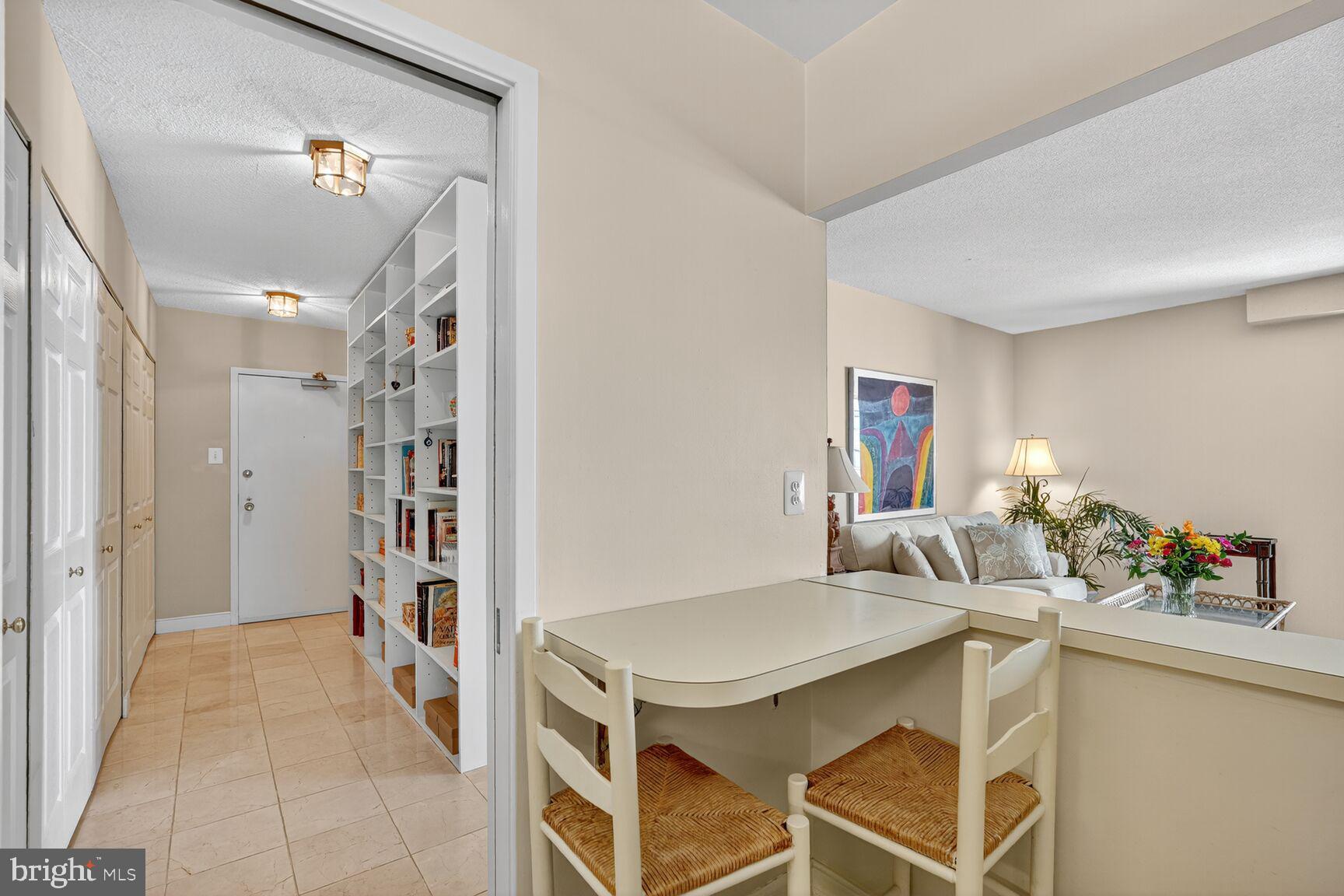 4515 Willard Avenue, Unit 1421S Chevy Chase, MD 20815 - Photo 9 of 53 a view of a kitchen and living room