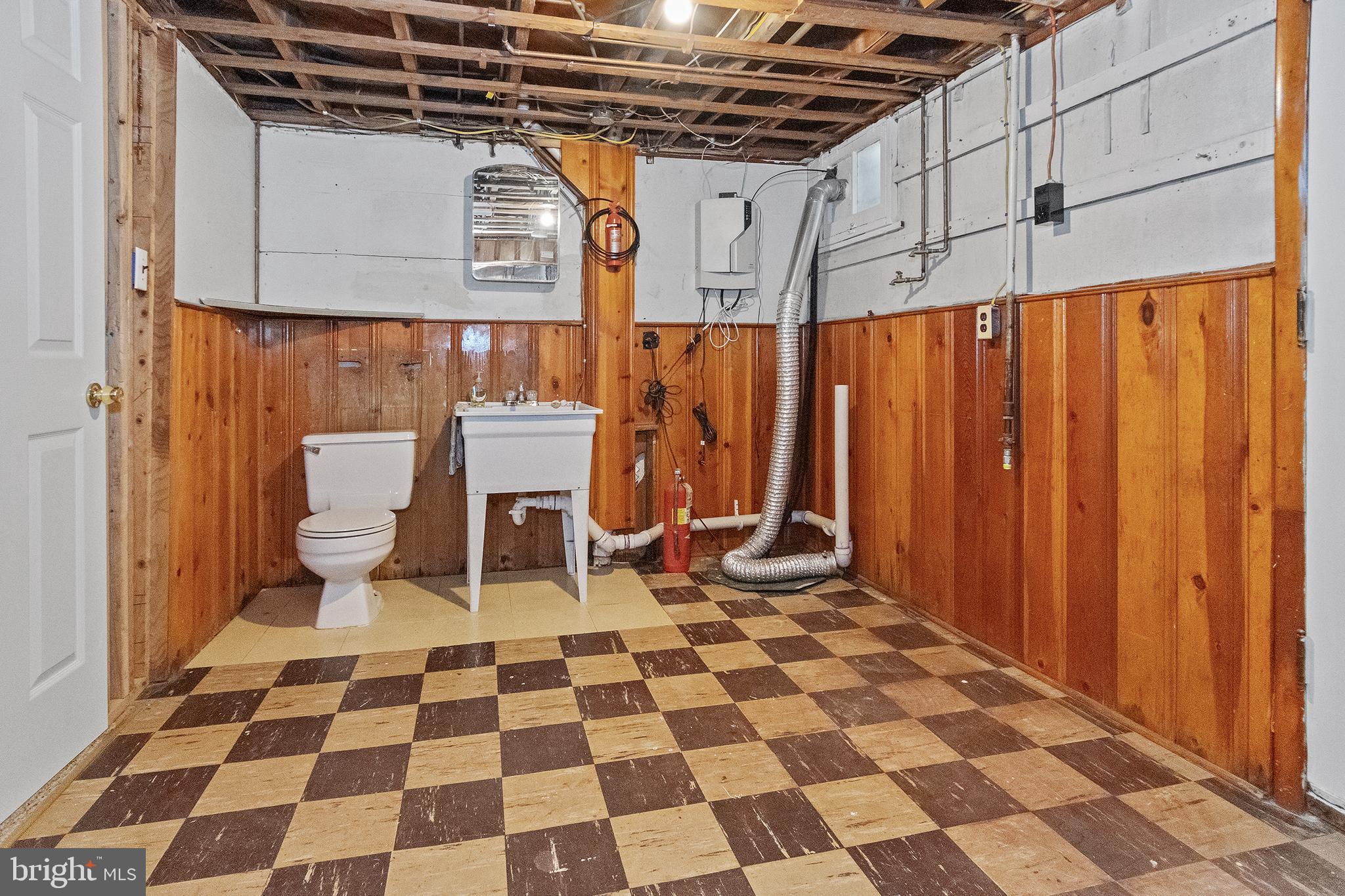 2816 Southbrook Road Baltimore, MD 21222 - Photo 16 of 24 Laundry Area w/ Flush