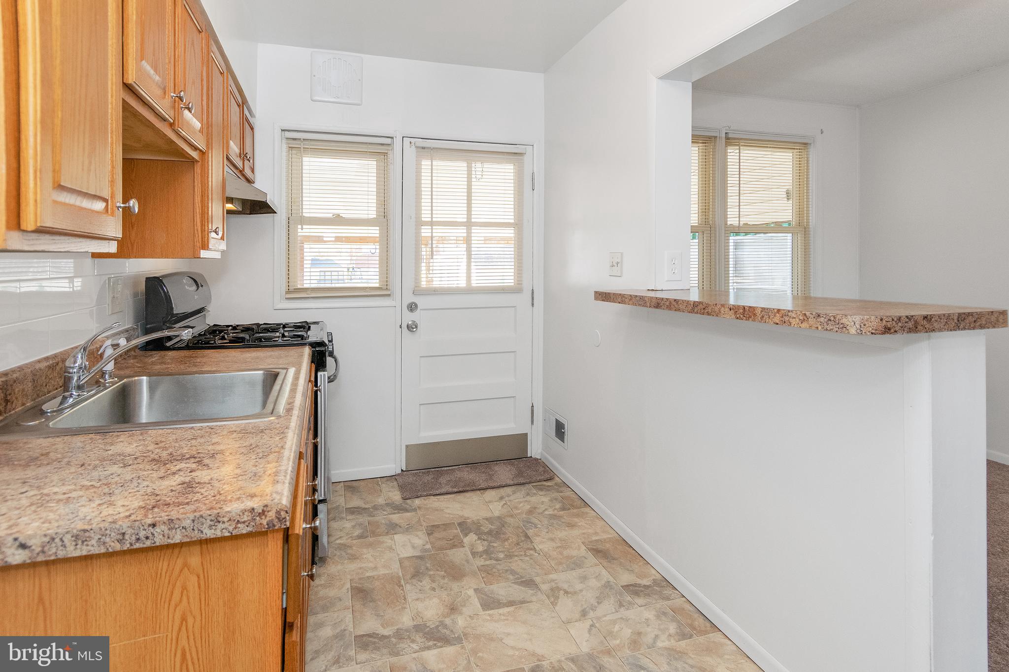 2816 Southbrook Road Baltimore, MD 21222 - Photo 10 of 24 Kitchen Door to Patio