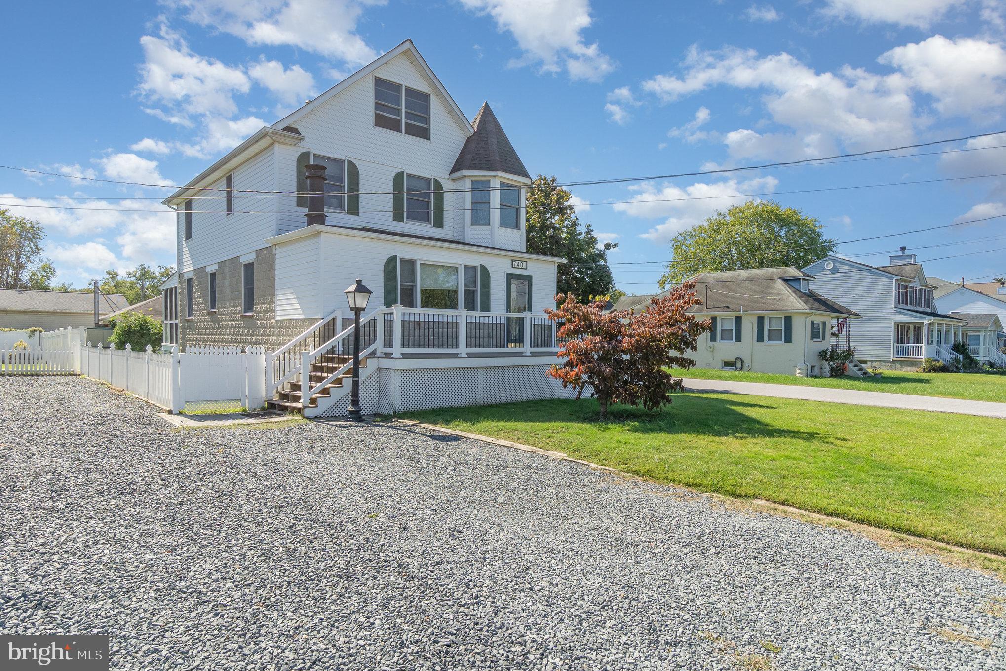 7401 Greenbank Road Baltimore, MD 21220 - Photo 3 of 58 a front view of a house with garden