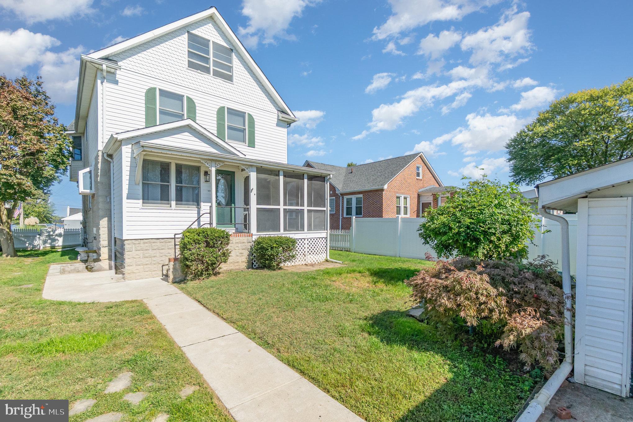 7401 Greenbank Road Baltimore, MD 21220 - Photo 44 of 58 a front view of a house with garden