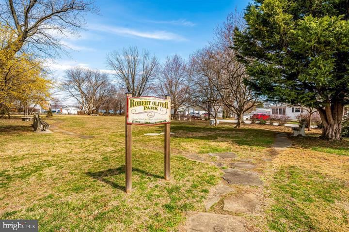7401 Greenbank Road Baltimore, MD 21220 - Photo 57 of 58 a street view with residential house