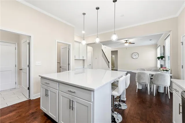 a very nice looking dining room with a table and chairs