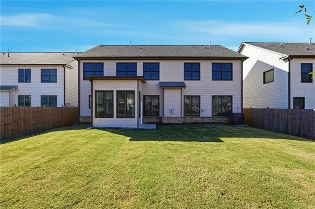 a view of swimming pool with a yard