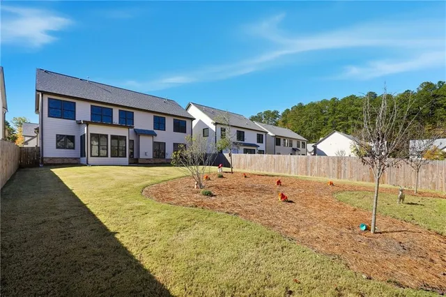 a view of swimming pool with outdoor seating