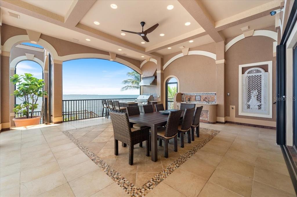 266 Bangsberg Road Southeast Port Charlotte, FL 33952 - Photo 12 of 100 a view of a dining room with furniture window and wooden floor