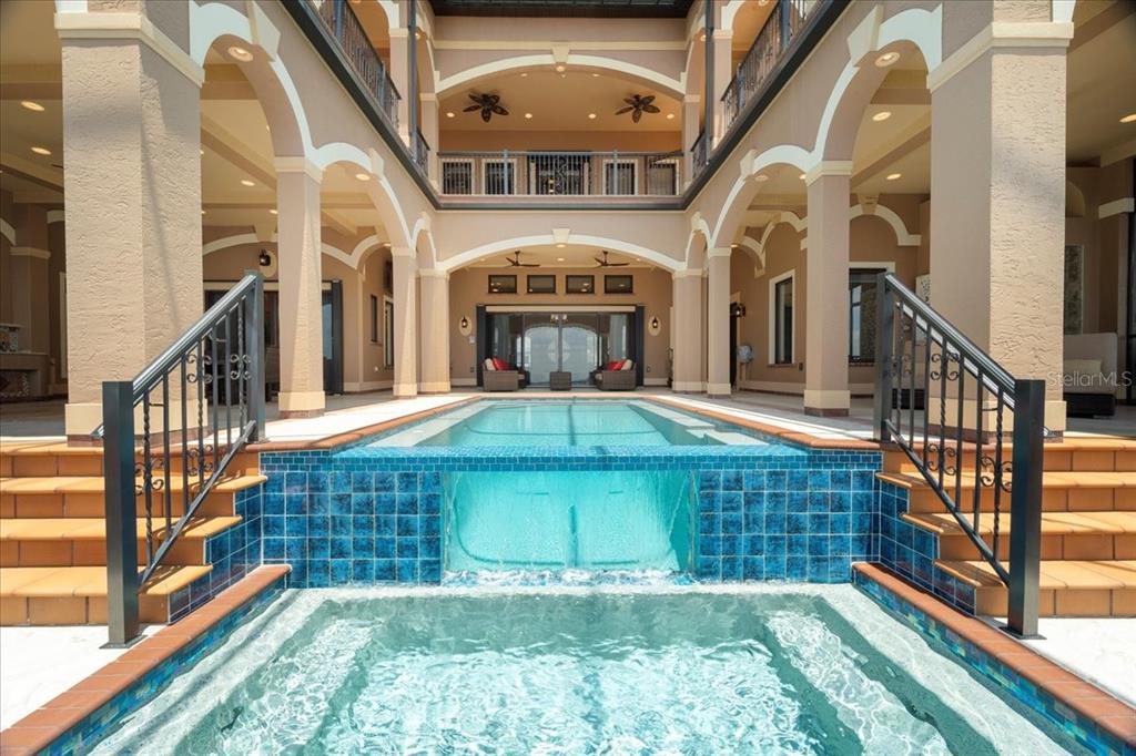 266 Bangsberg Road Southeast Port Charlotte, FL 33952 - Photo 17 of 100 a view of an entryway with a small yard