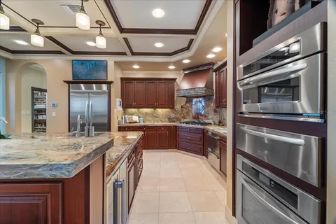 a living room with furniture a rug and a window