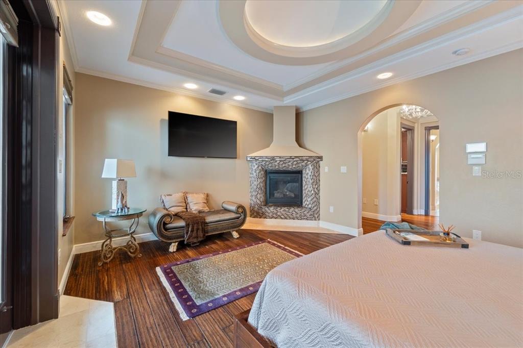 266 Bangsberg Road Southeast Port Charlotte, FL 33952 - Photo 48 of 100 a living room with furniture and a fireplace