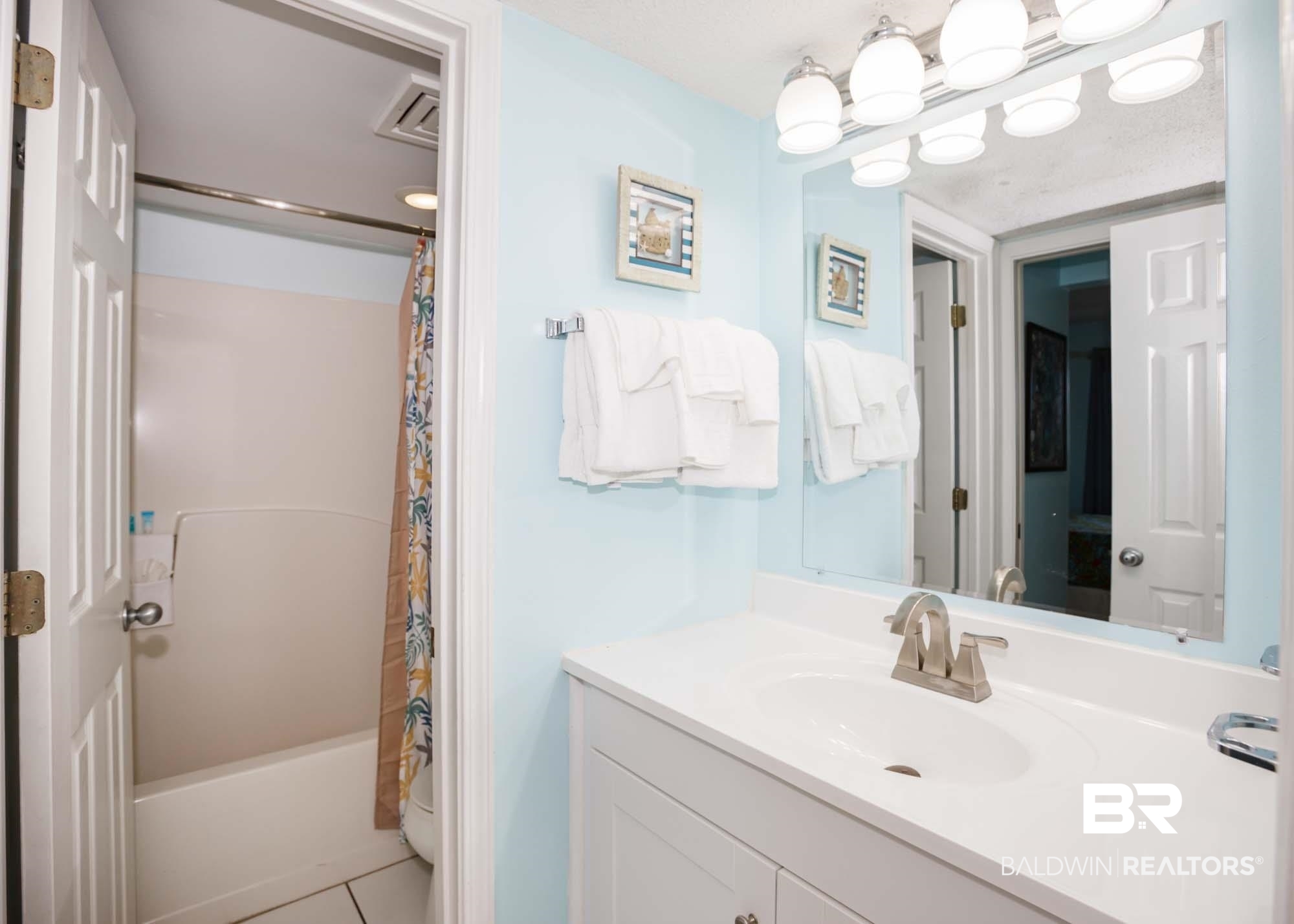 645 Plantation Road, Unit 6311 Gulf Shores, AL 36542 - Photo 8 of 43 Full bathroom with vanity, tile patterned flooring, and shower / bath combo