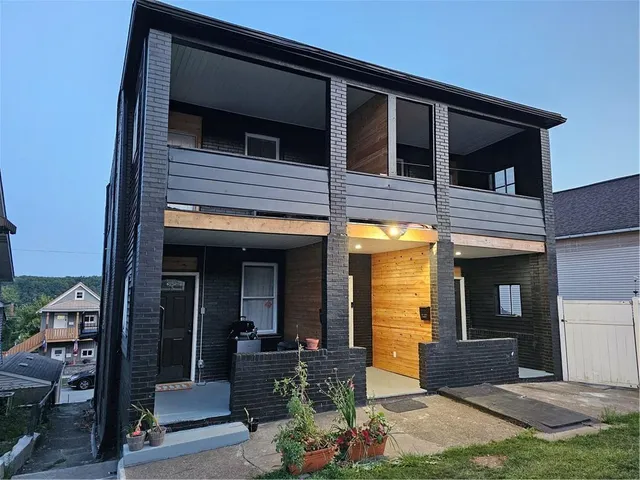 a view of house with outdoor space