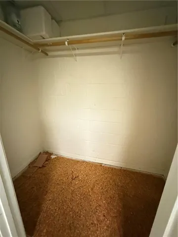 a view of a room with racks on the wall