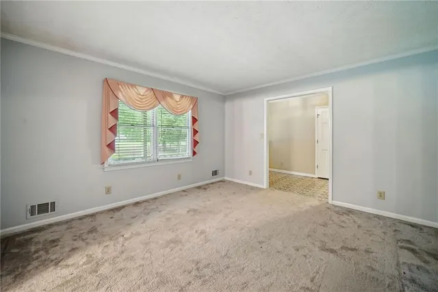 an empty room with windows