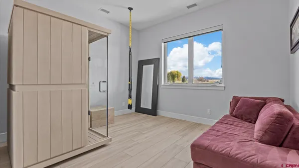 a living room with furniture and a window