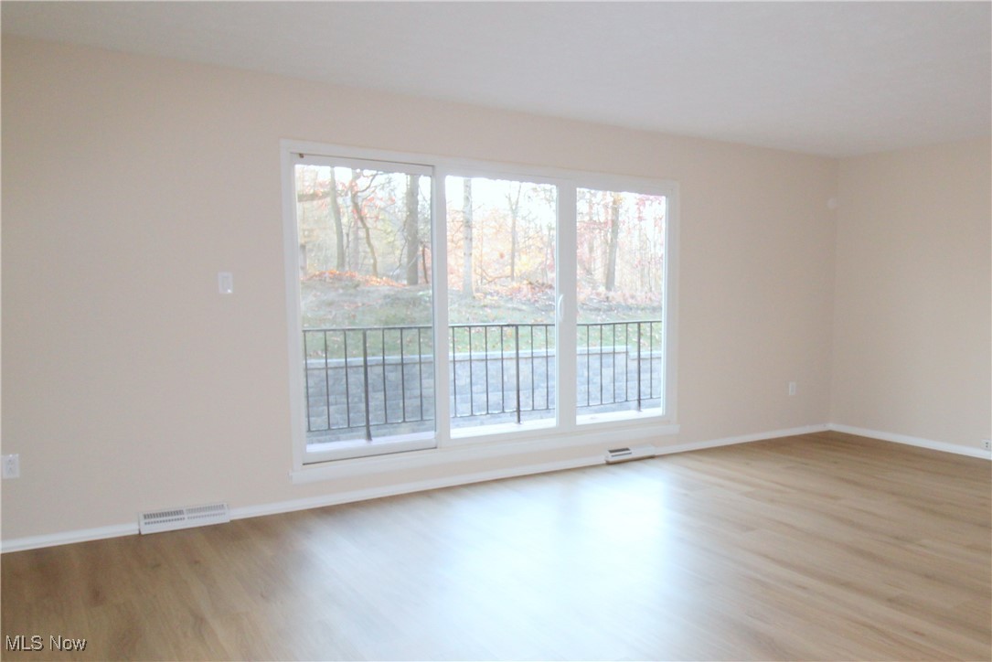 6476 State Road Cleveland, OH 44134 - Photo 12 of 26 Additional View of Living Area with Sliders to Private Back Deck