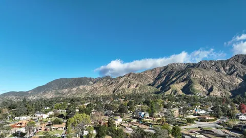 a view of mountains and valleys