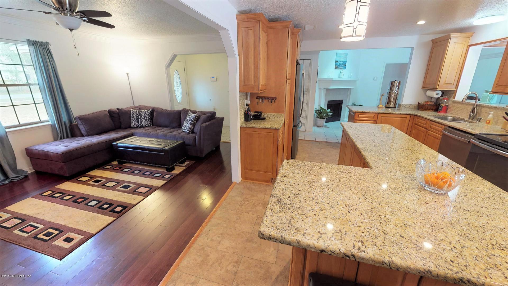 4720 Herton Road Jacksonville, FL 32258 - Photo 6 of 38 Family Room & Kitchen View 1