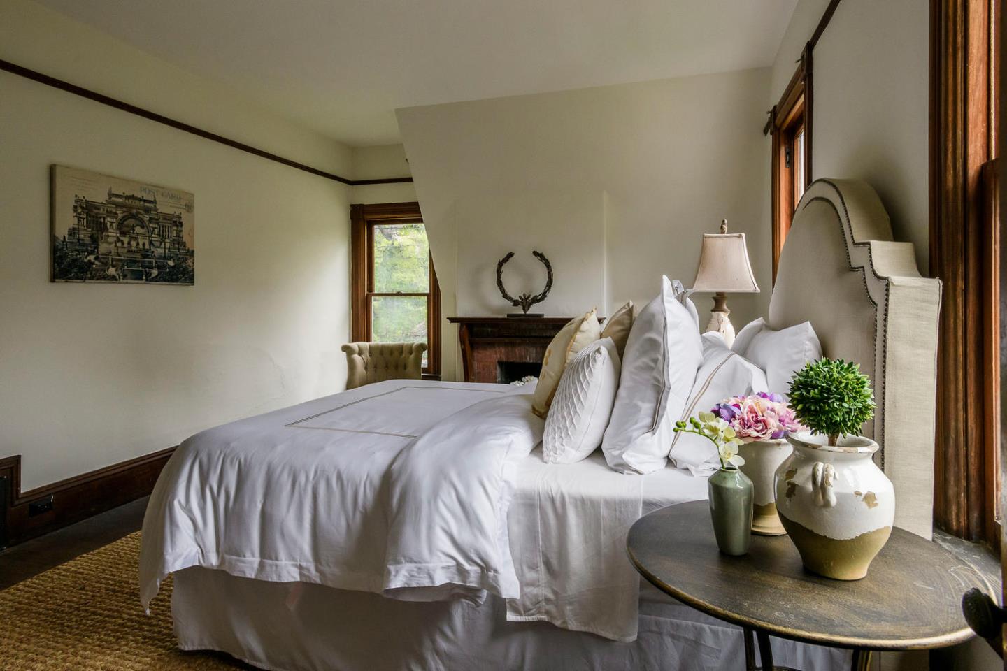 1136 Waverley Street Palo Alto, CA 94301 - Photo 18 of 28 a bedroom with a bed and a potted plant