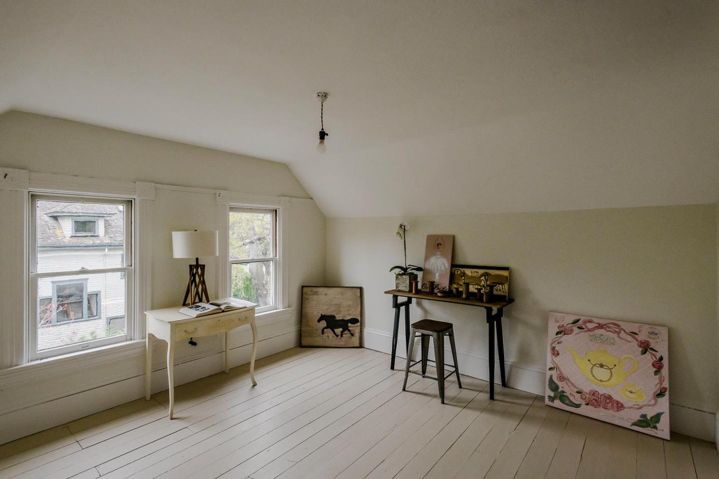 1136 Waverley Street Palo Alto, CA 94301 - Photo 25 of 28 a living room with furniture and wooden floor