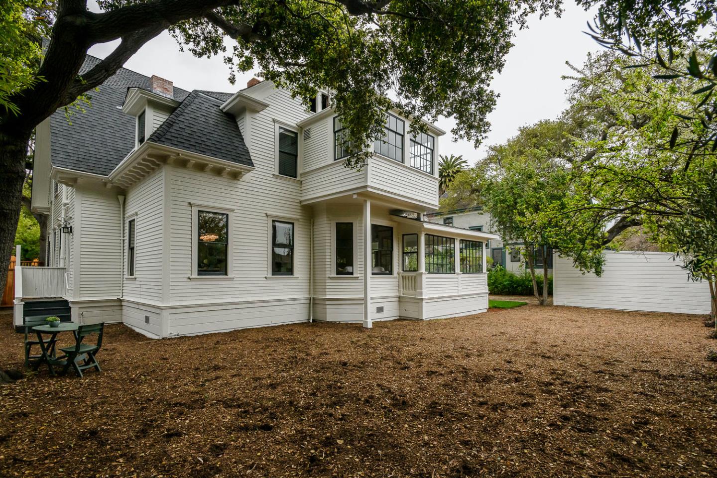 1136 Waverley Street Palo Alto, CA 94301 - Photo 27 of 28 a front view of a house with a garden