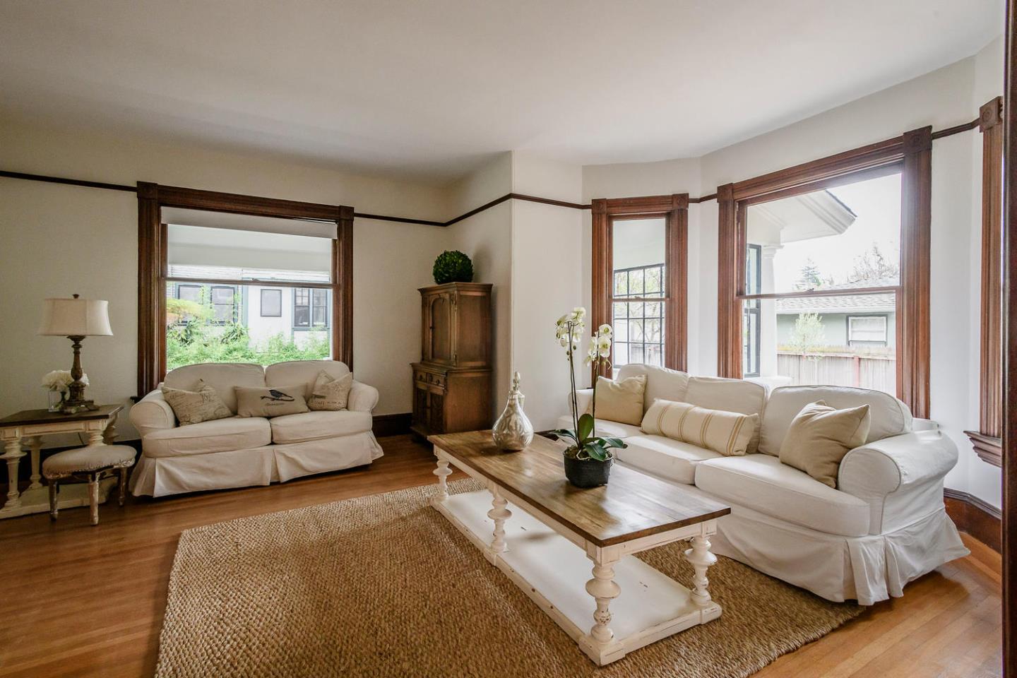 1136 Waverley Street Palo Alto, CA 94301 - Photo 7 of 28 a living room with furniture and a large window