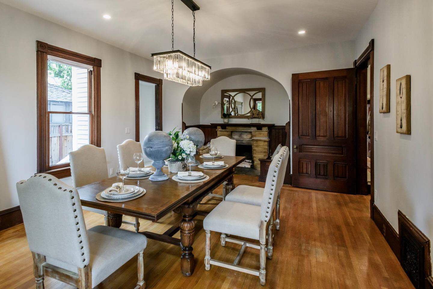 1136 Waverley Street Palo Alto, CA 94301 - Photo 9 of 28 a view of a dining room with furniture window and wooden floor