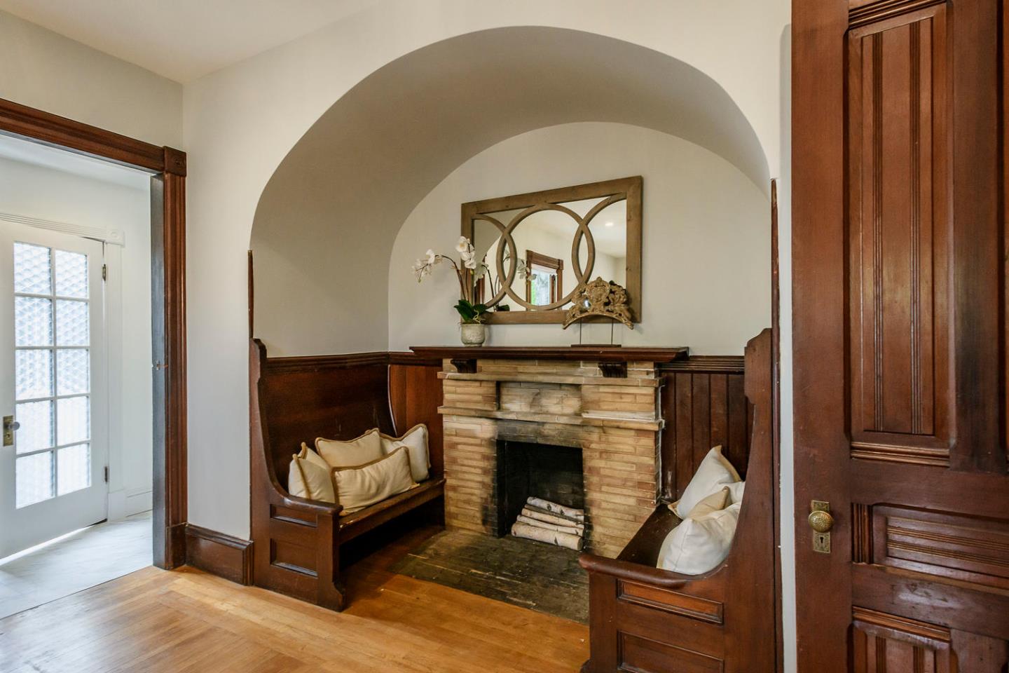 1136 Waverley Street Palo Alto, CA 94301 - Photo 10 of 28 a living room with furniture and a fireplace