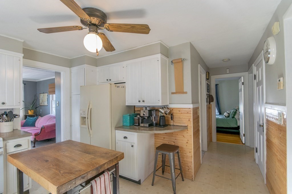 114 Appleton Street Springfield, MA 01108 - Photo 15 of 35 a kitchen that has a table and chairs in it