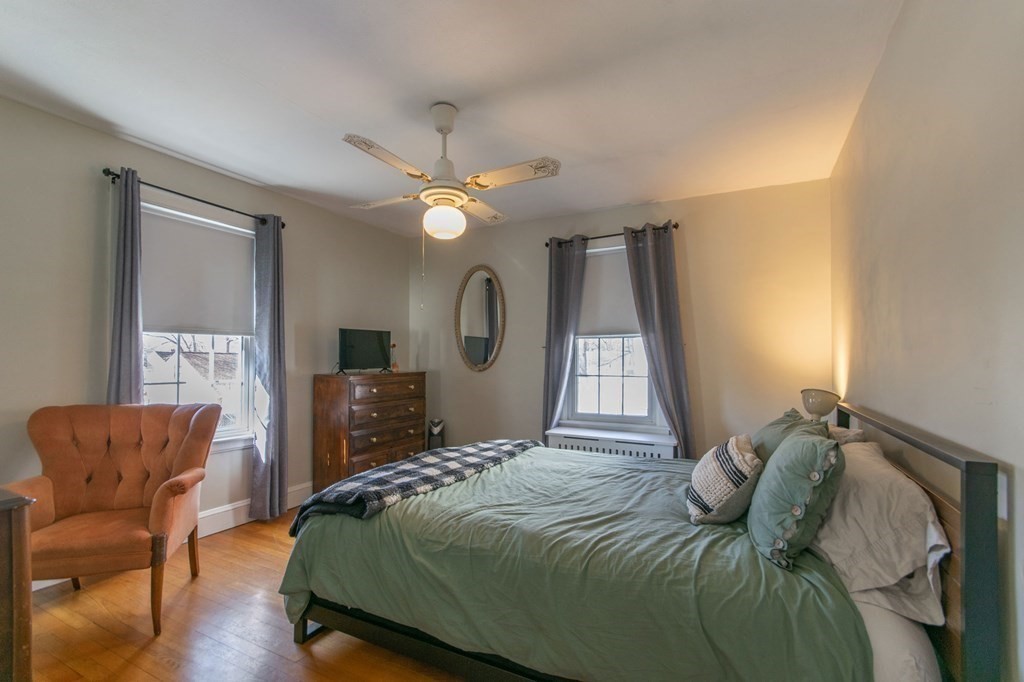 114 Appleton Street Springfield, MA 01108 - Photo 23 of 35 a bedroom with a bed and a chair