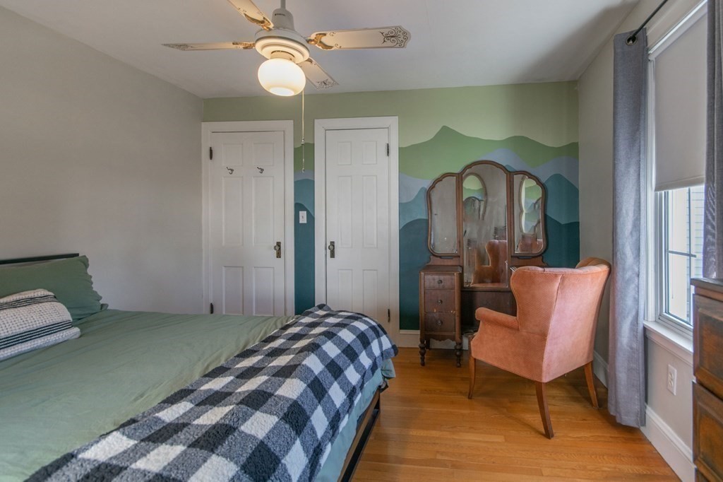 114 Appleton Street Springfield, MA 01108 - Photo 24 of 35 a bedroom with a bed and a chair