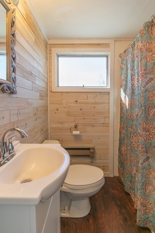 114 Appleton Street Springfield, MA 01108 - Photo 29 of 35 a bathroom with a sink a toilet and shower
