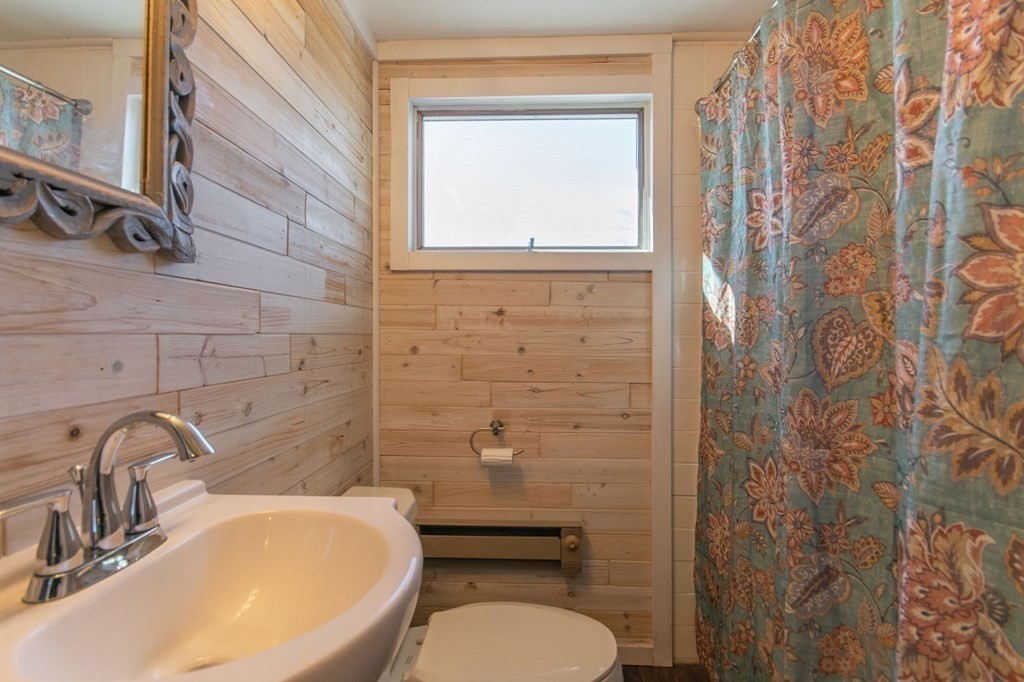 114 Appleton Street Springfield, MA 01108 - Photo 30 of 35 a bathroom with a sink a toilet and shower
