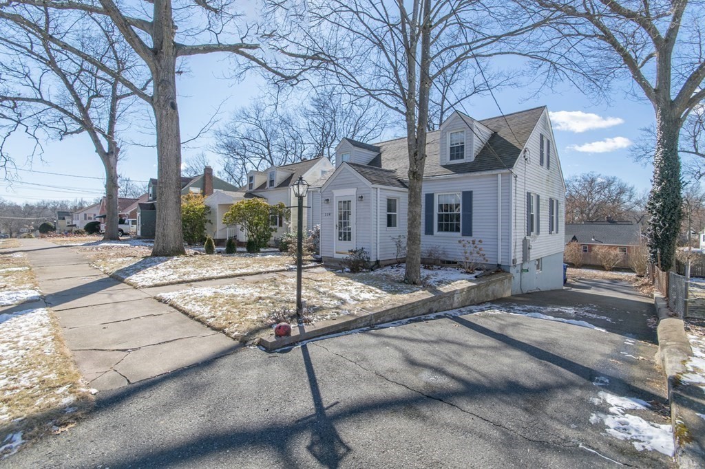 114 Appleton Street Springfield, MA 01108 - Photo 3 of 35 a front view of house with yard and trees around