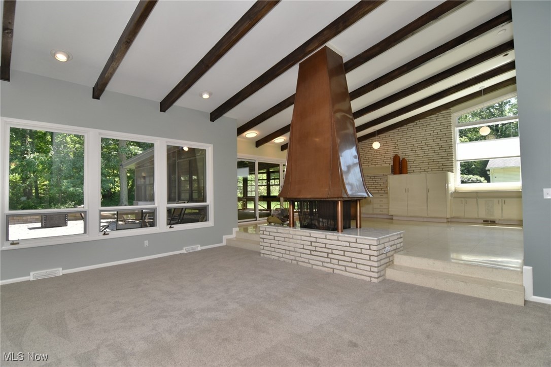2793 Belgrave Road Cleveland, OH 44124 - Photo 10 of 40 Great room featuring fire place and beam ceilings