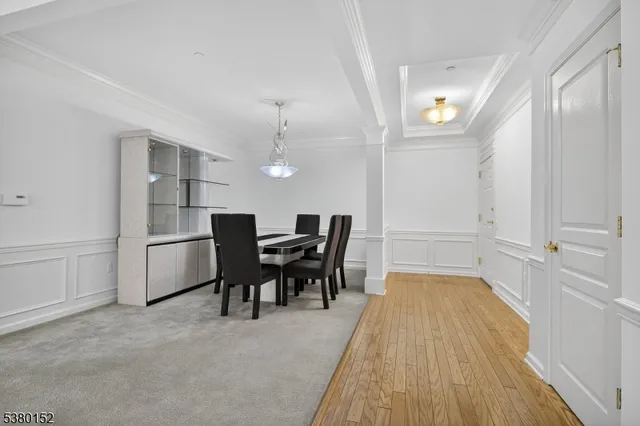a kitchen with stainless steel appliances granite countertop a stove top oven a sink and dishwasher