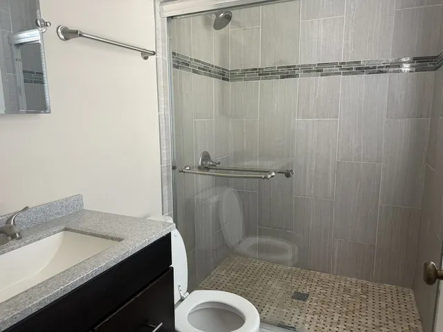 a bathroom with a toilet and a sink