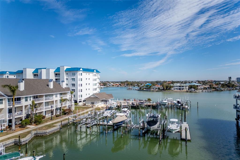9341 Blind Pass Road St. Pete Beach, FL 33706 - Photo 41 of 44 a view of a lake with a city