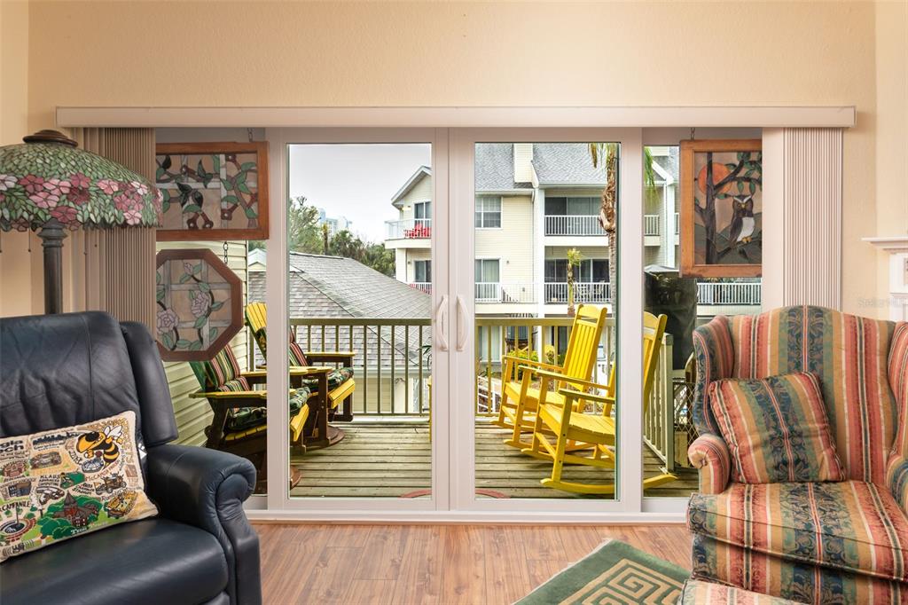 9341 Blind Pass Road St. Pete Beach, FL 33706 - Photo 5 of 44 a view of a living room and a window in a living room