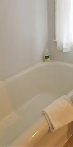a bathroom with a bathtub