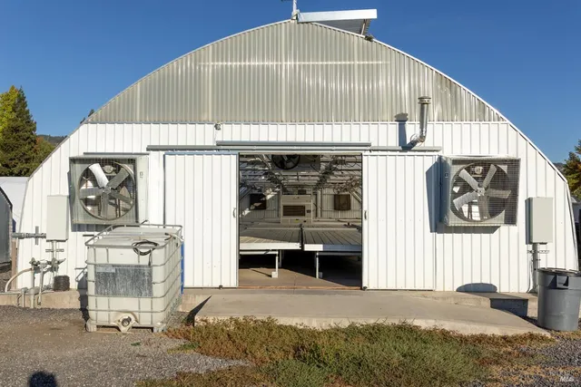 a view of a balcony with chairs
