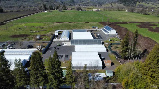 an aerial view of a house with garden