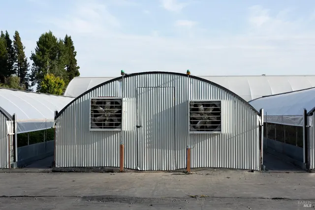 a view of a house with a garage