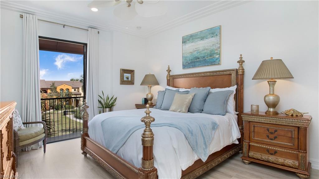 9078 Albion Lane South, Unit 6603 Naples, FL 34113 - Photo 16 of 41 a bedroom with a bed and a window