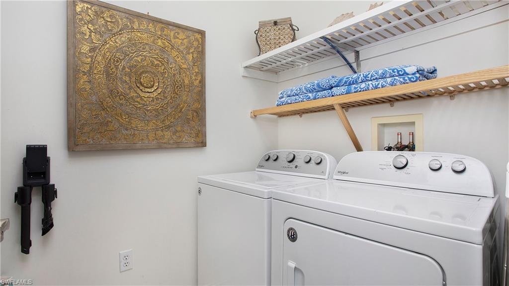 9078 Albion Lane South, Unit 6603 Naples, FL 34113 - Photo 23 of 41 a utility room with dryer and washer