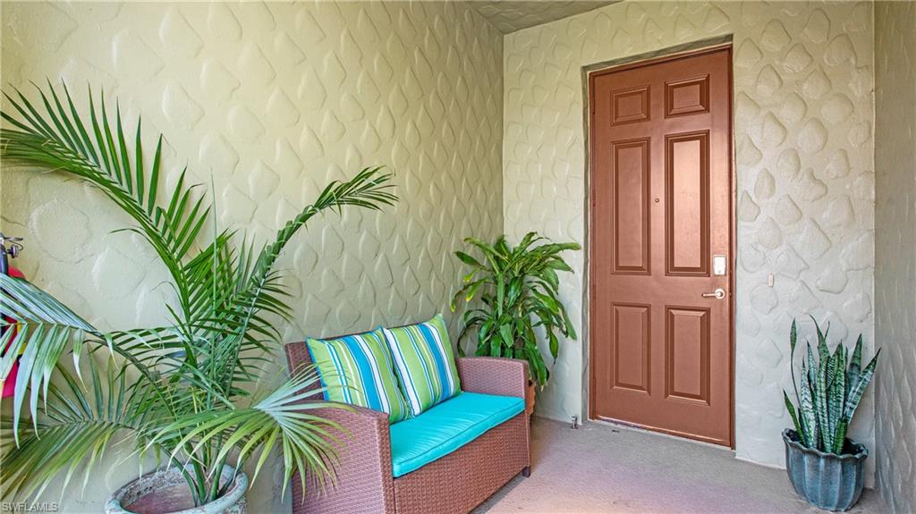 9078 Albion Lane South, Unit 6603 Naples, FL 34113 - Photo 4 of 41 a view of a entryway door of the house