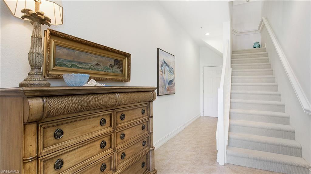 9078 Albion Lane South, Unit 6603 Naples, FL 34113 - Photo 5 of 41 a view of hallway with stairs